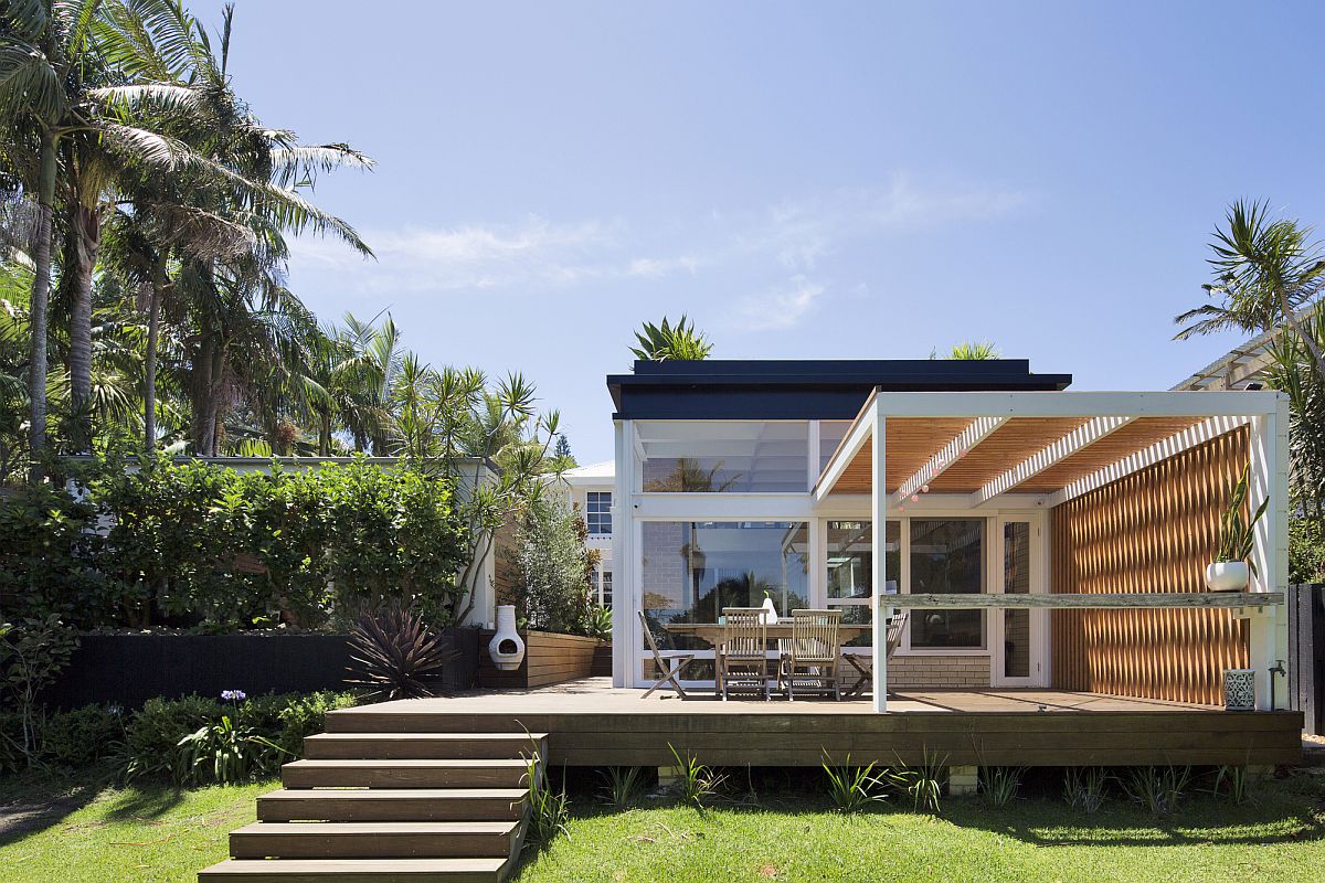 Elevated wooden deck next to the garden