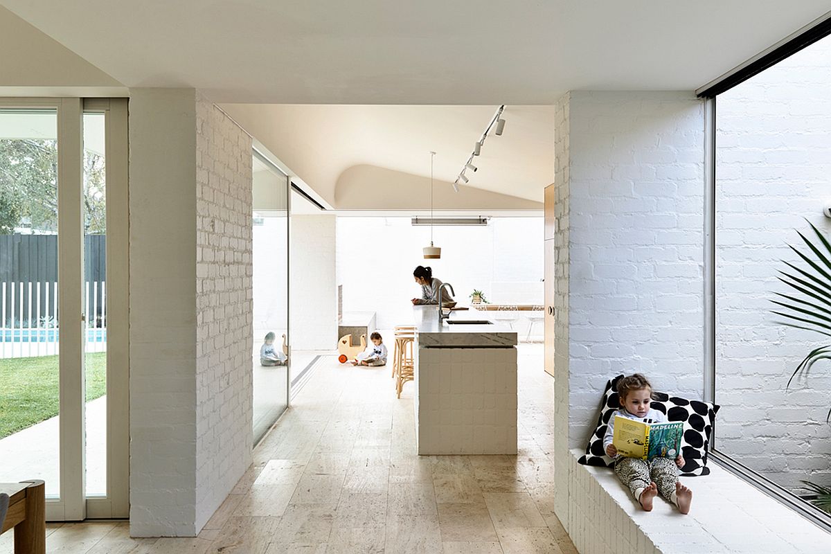 Exposed and painted brick walls of the Melbourne home