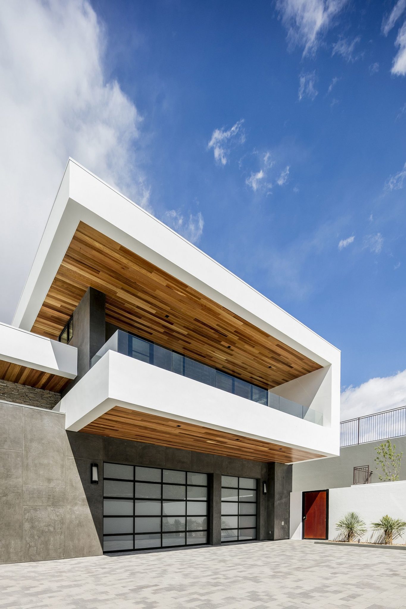 Facade of the Ascaya with wood and concrete