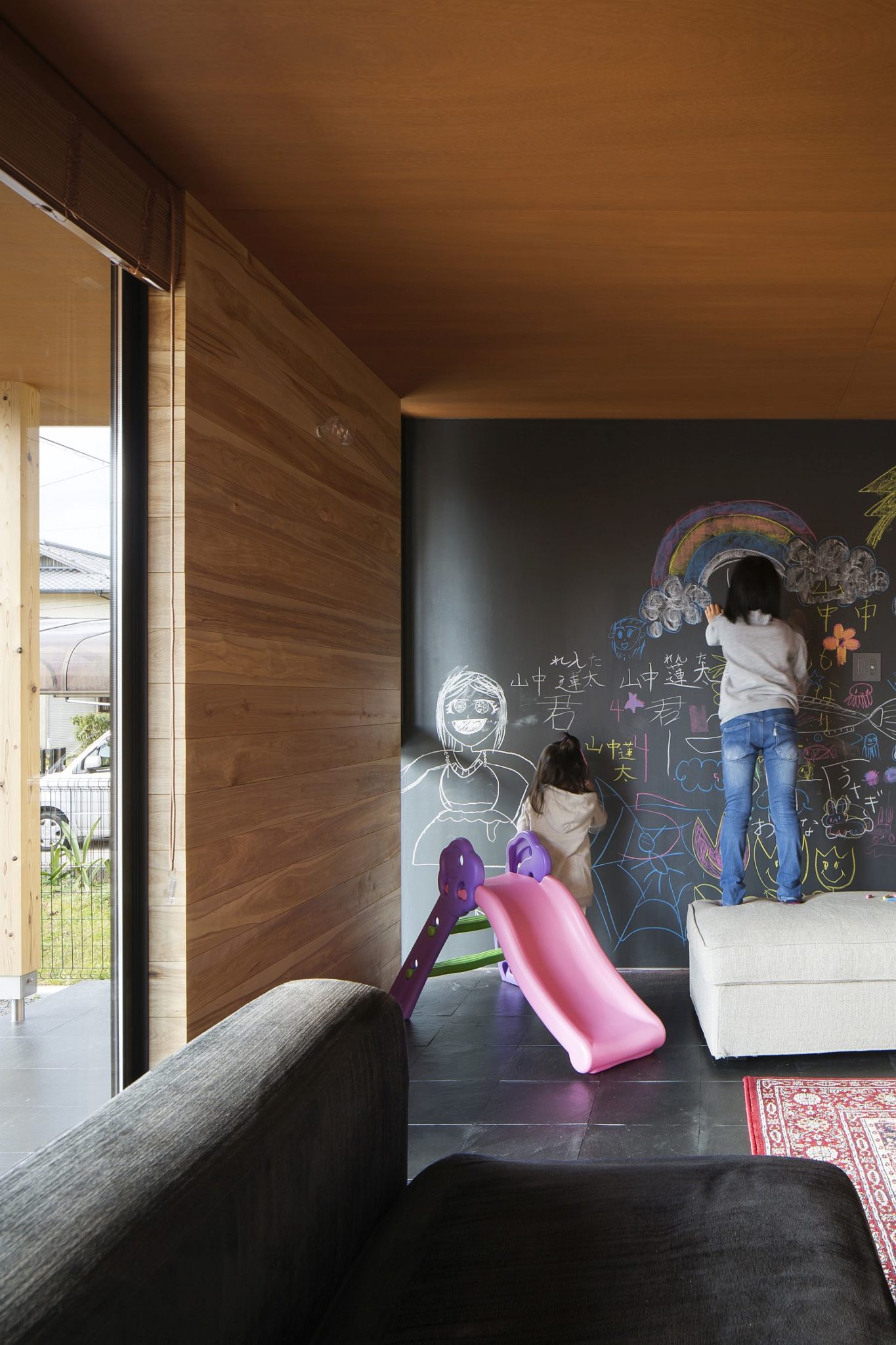 Fun kids' play area with chalkboard wall