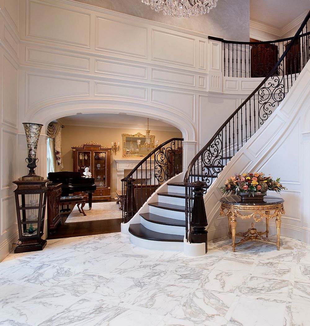 Large, sweeping Victorian style entryway with a modern touch