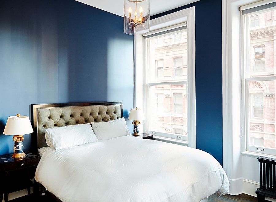 Light-filled contemporary bedroom in bold blue and white