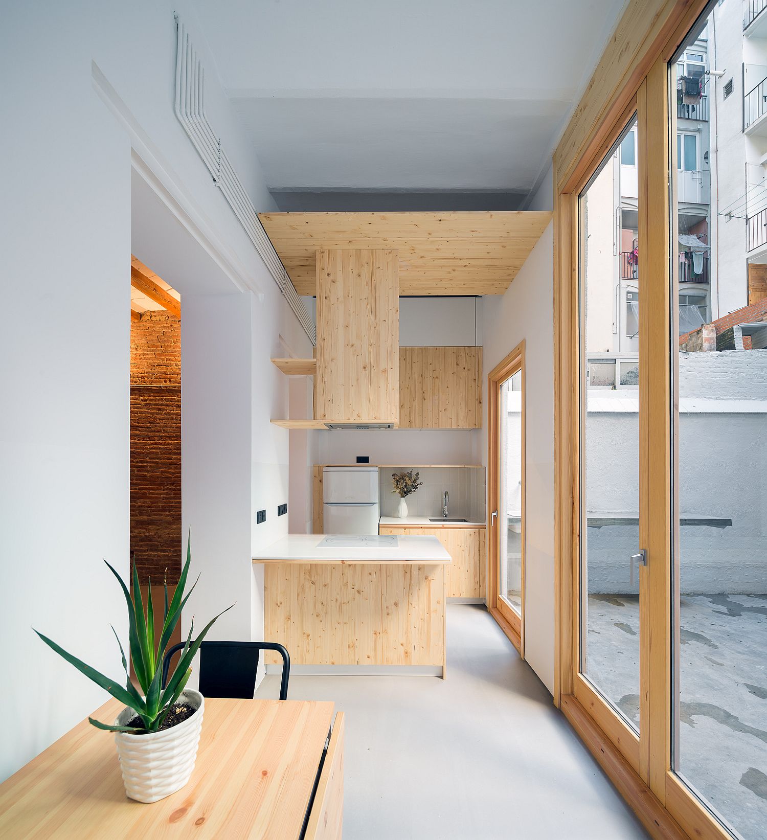 Light-filled kitchen of the stylish apartment