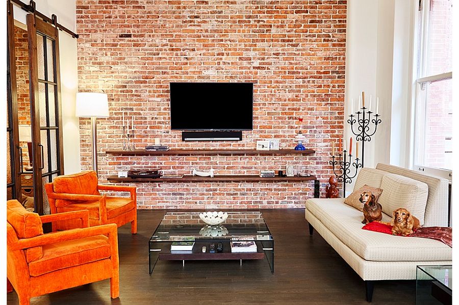 Living room of New York loft with exposed brick wall