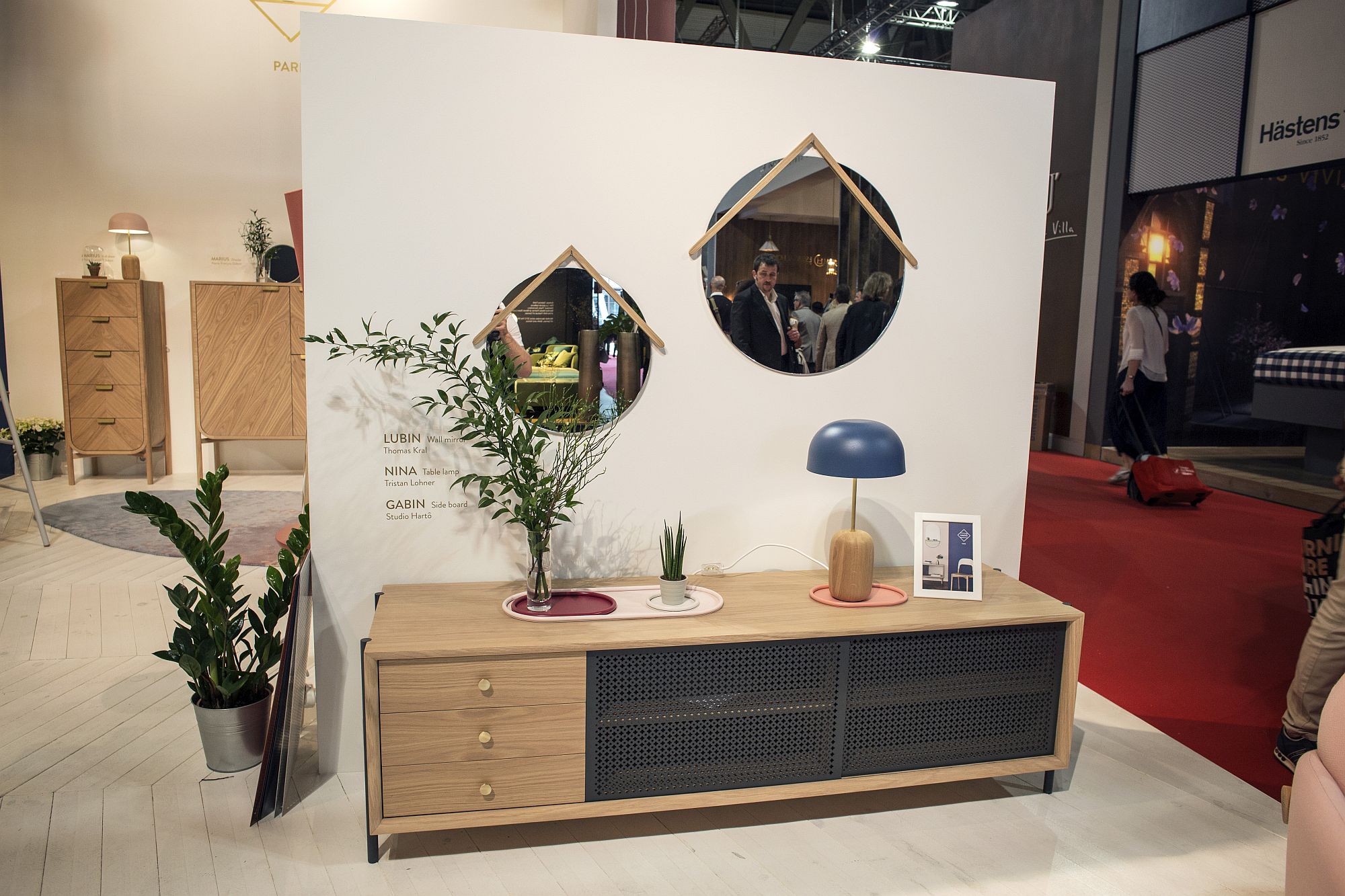 Metallic mesh doors give the wooden sideboard a cool, industrial appeal