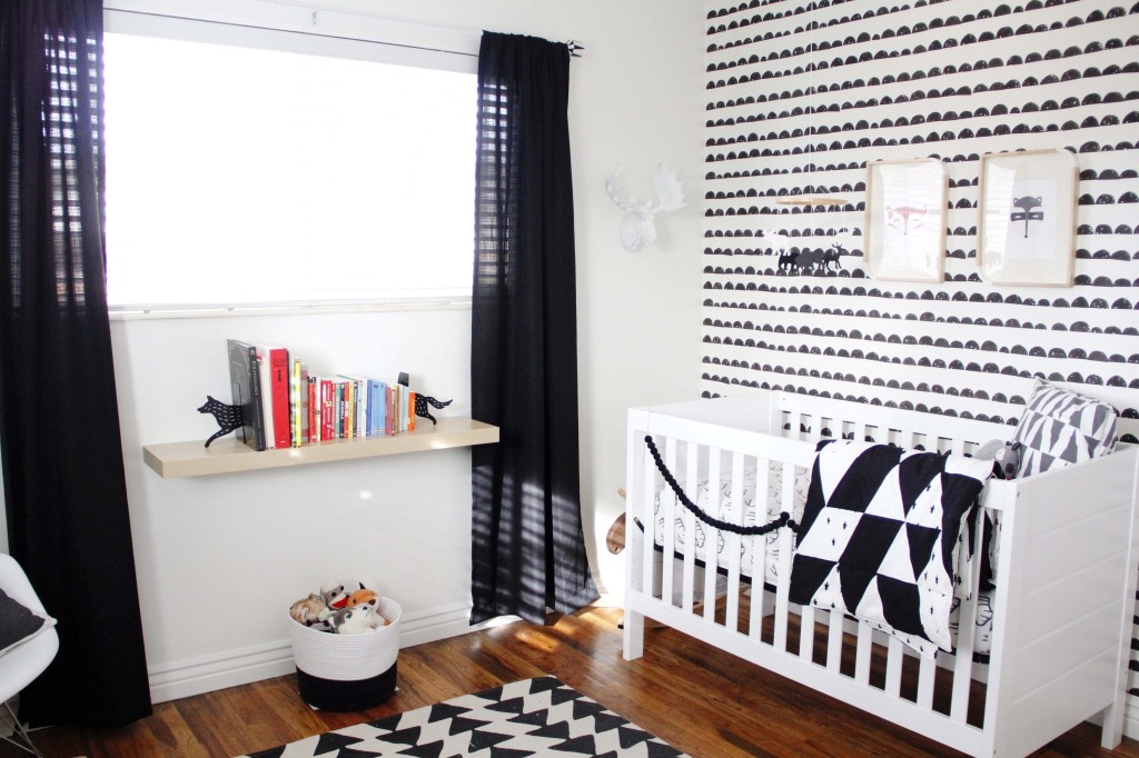 Monochrome nursery with black curtains