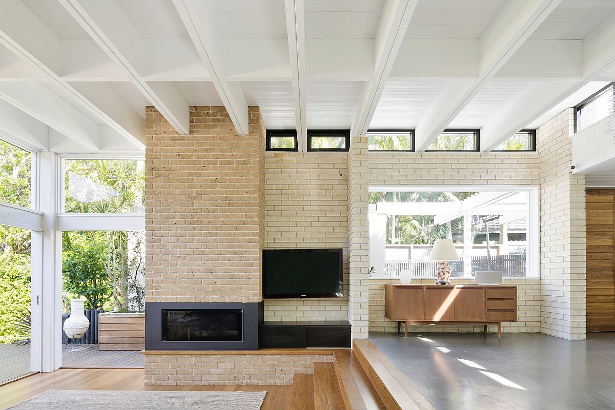 Painted and sealed brick walls blend into the modern living space