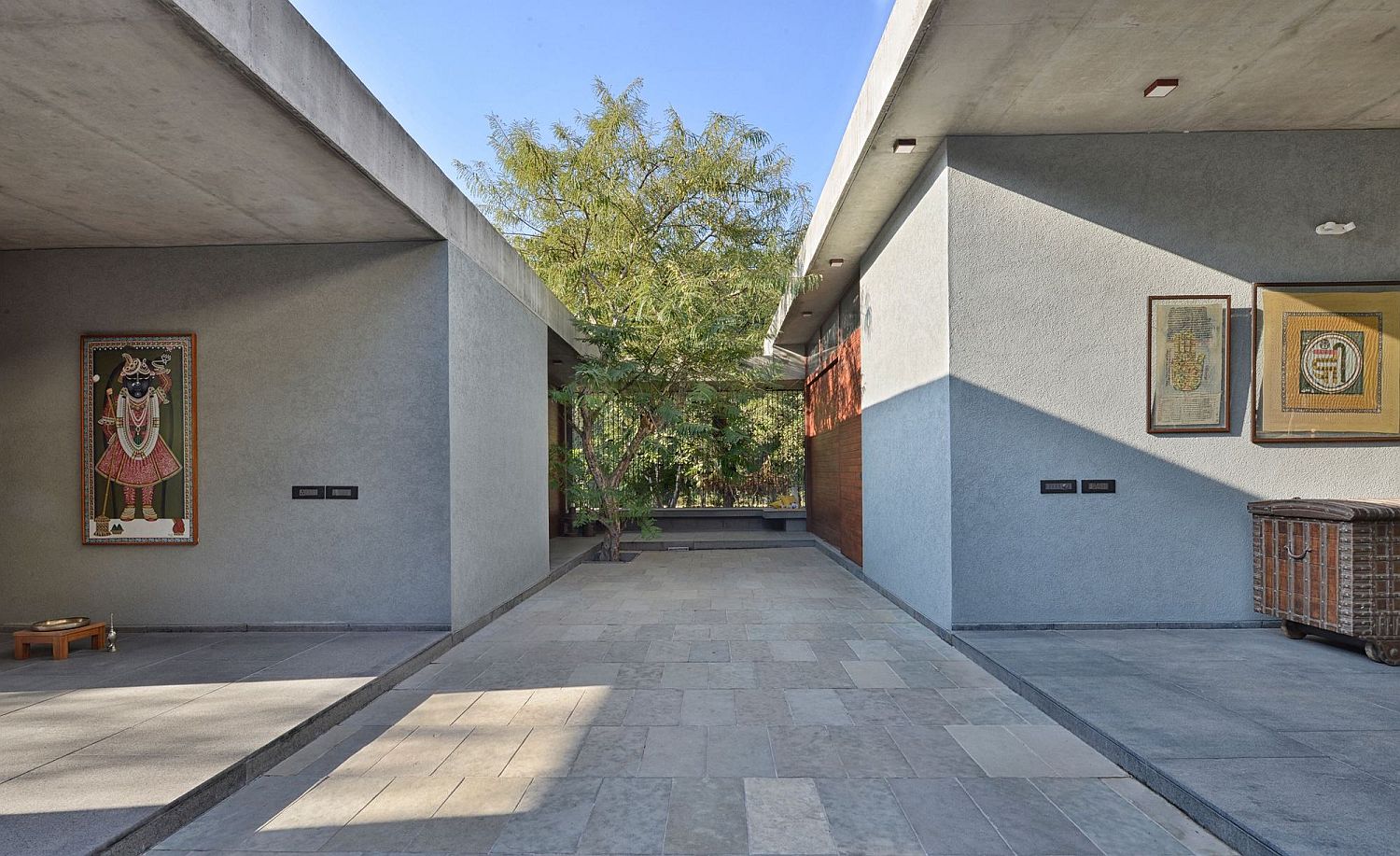 Rough brown kotah stone used to shape the interior and courtyards around the house