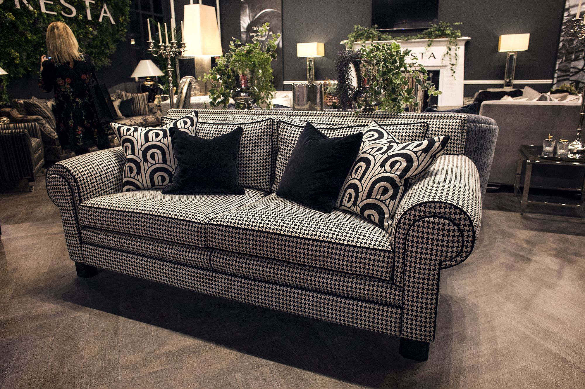 Simple black and white pattern of the sofa brings unique charm to any living space it adorns