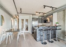 Simple-kitchen-and-dining-area-arrangement-of-the-industrial-apartment-217x155