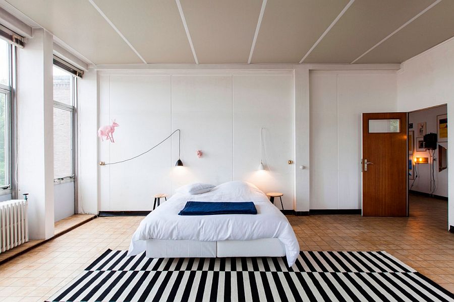 Simple-striped-monochrome-rug-in-a-minimalist-bedroom