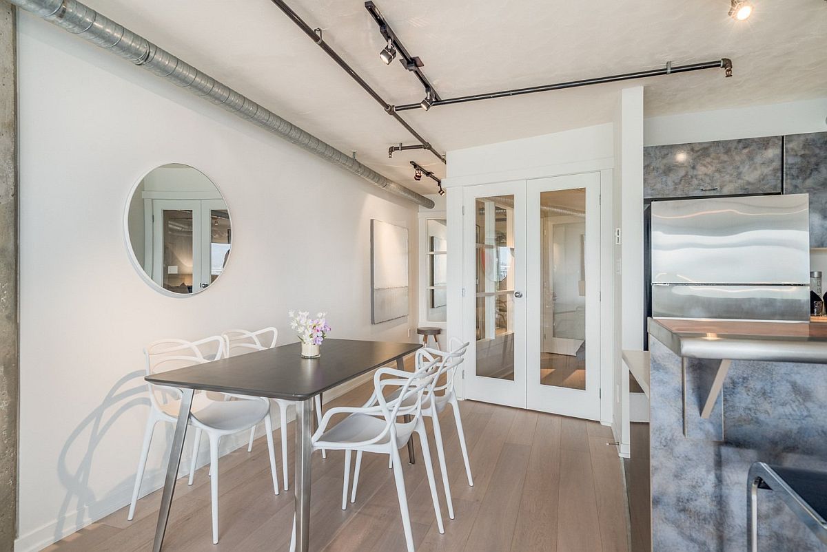 Small dining area with chairs in white