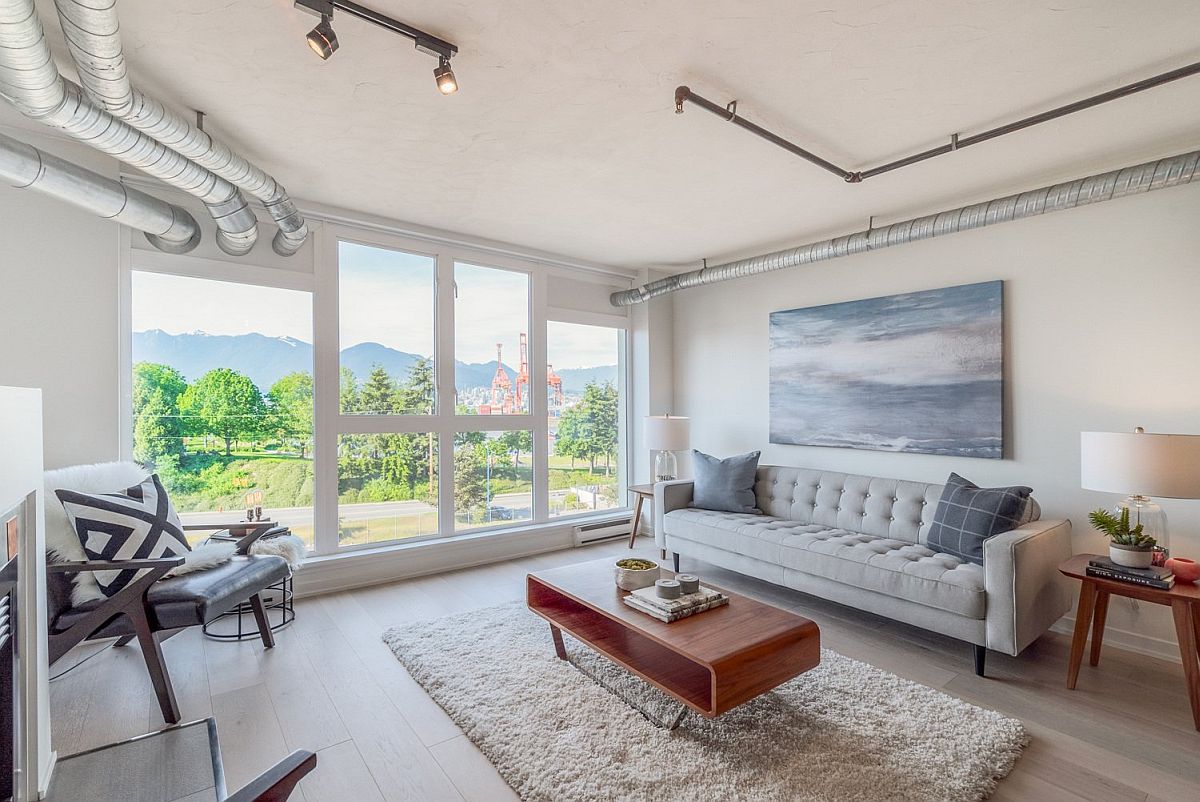 Small living room with couch in gray and trendy coffee table