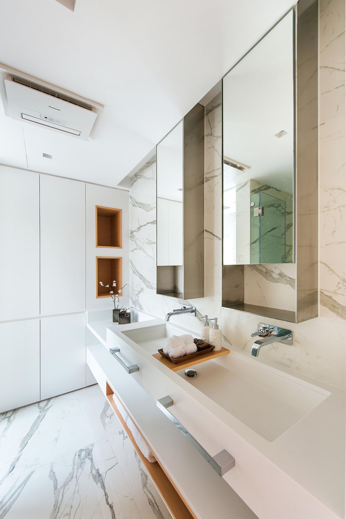 Sophisticated modern bathroom with marble flooring and walls