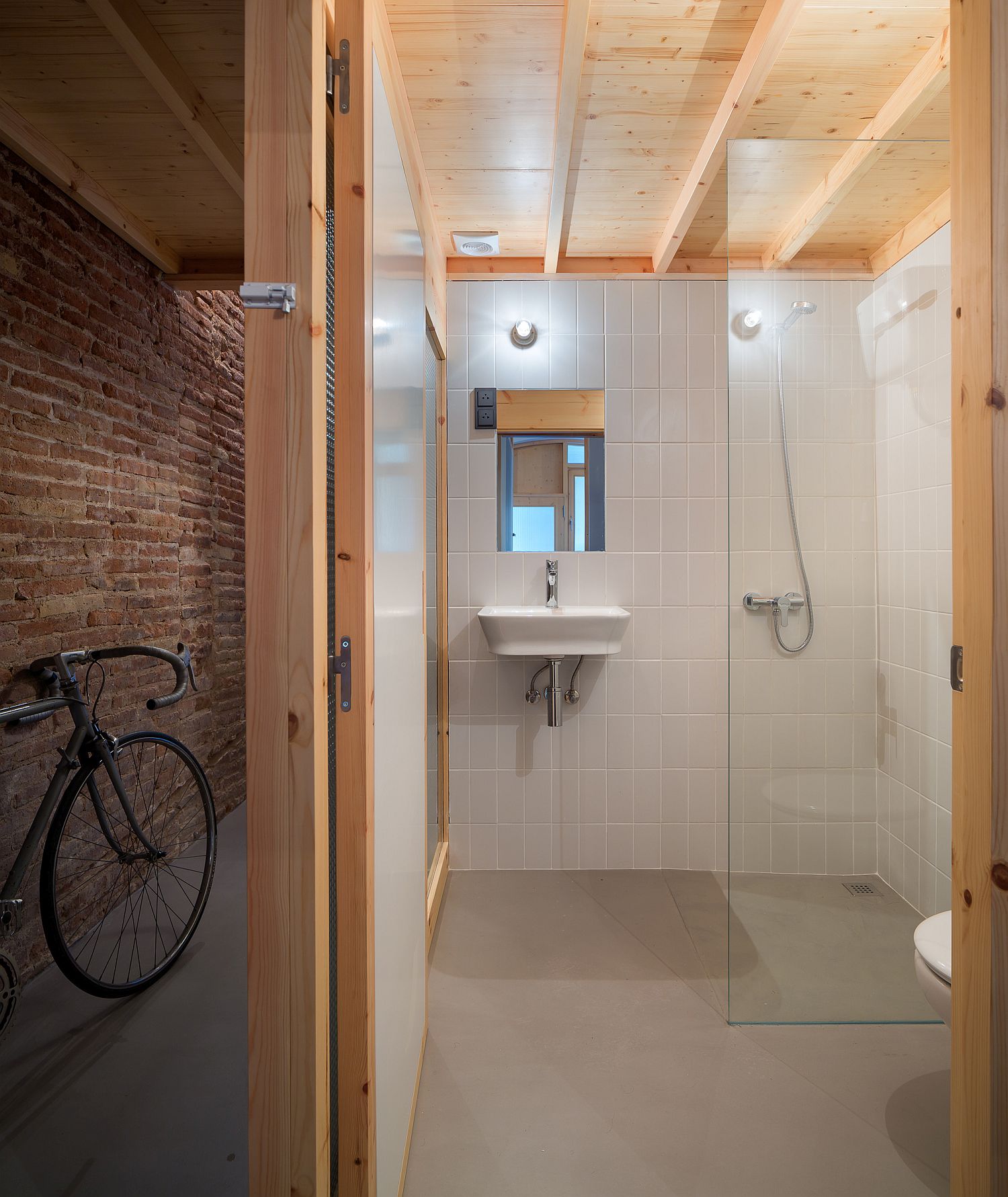 Space-savvy bathroom design with translucent sliding doors