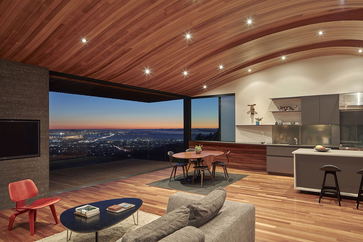 Wood Tube and Curved Ceiling Shape Skyline House Atop Eastbay Mountain