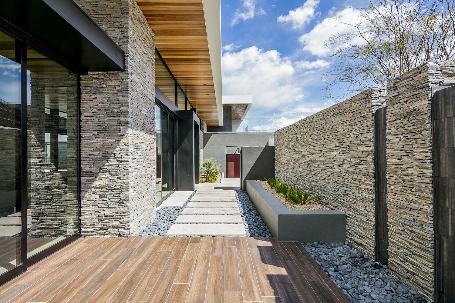 Stone-pathway-and-wooden-deck-of-the-Las-Vegas-home