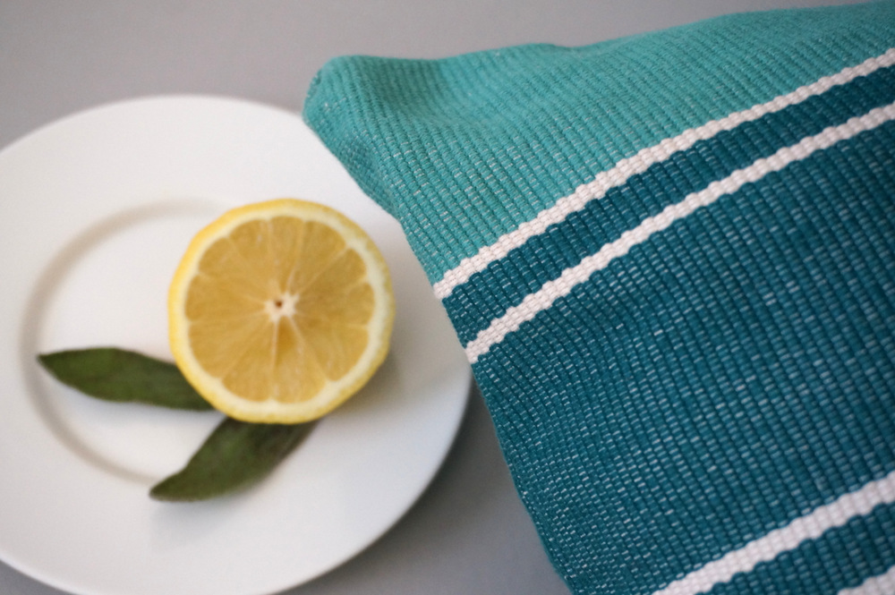 Striped turquoise pillow