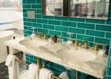 Turquoise-bathroom-with-marble-sink-and-golden-pipes-217x155