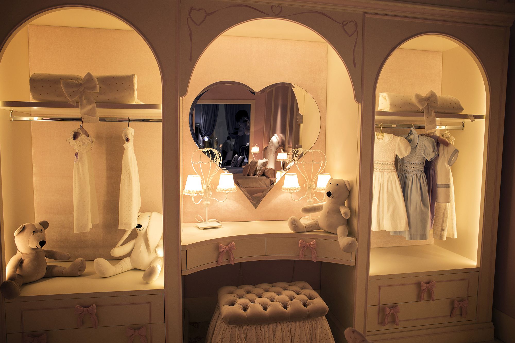 Ultra-cute heart shaped mirror in the white and pink bedroom