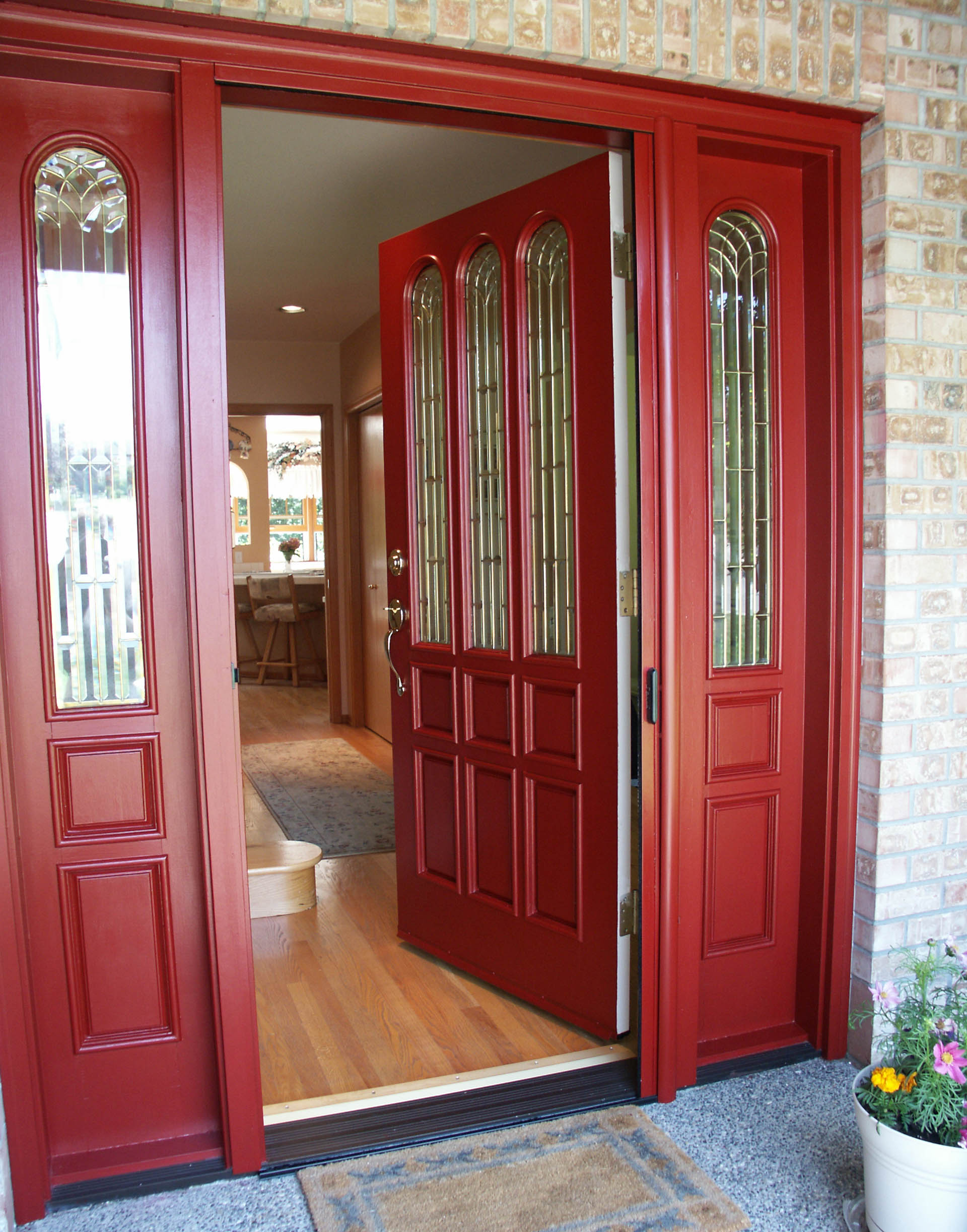 Wide-red-door-with-a-matching-door-frame-