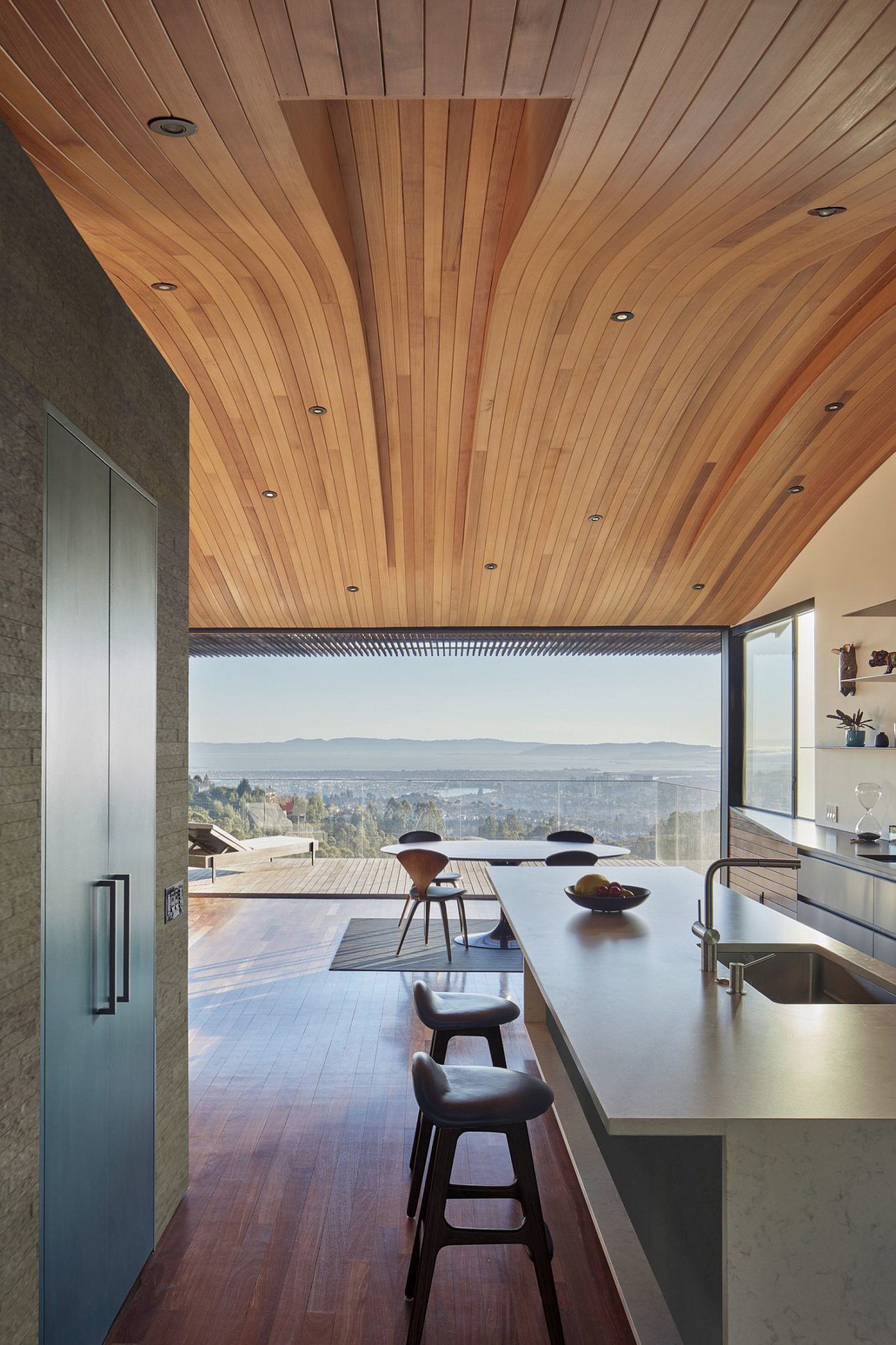 Wood Tube and Curved Ceiling Shape Skyline House Atop Eastbay Mountain