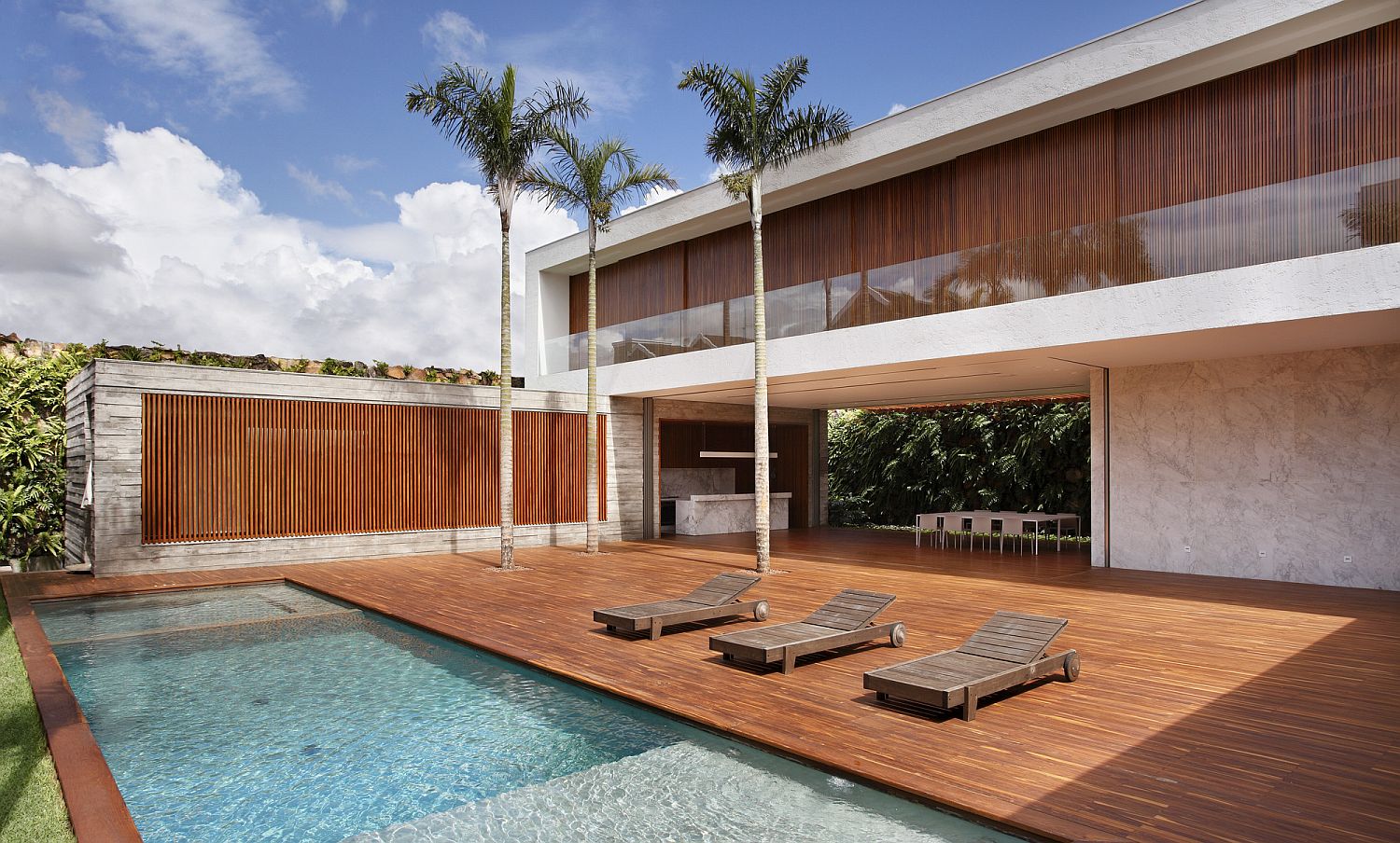 Wooden slats and Brise soleil give the central courtyard a stuning look