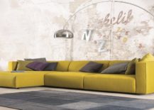 Yellow-sofa-stands-out-in-an-industrial-room-217x155