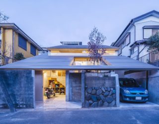 Chic Japanese House Integrates Old Retaining Wall With Woodsy Slanted Roof