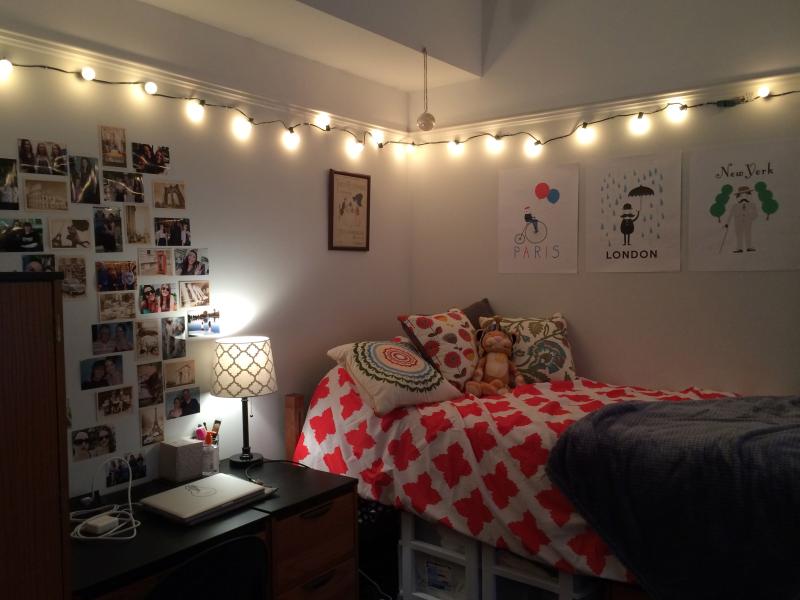 Bedroom wrapped up in string lights