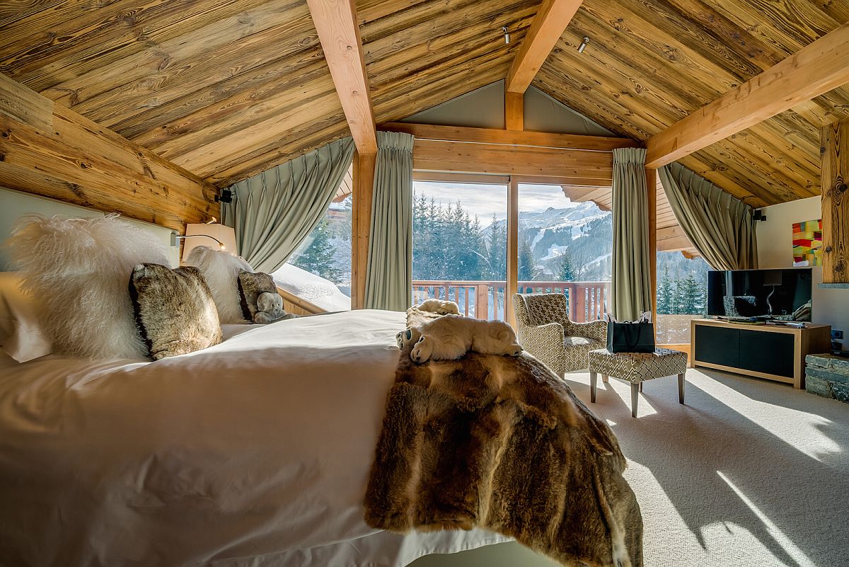 Chalet bedroom with views of french alps and sloped ceiling