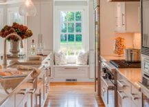 Charming-cottage-style-kitchen-with-a-comfy-window-seat-217x155