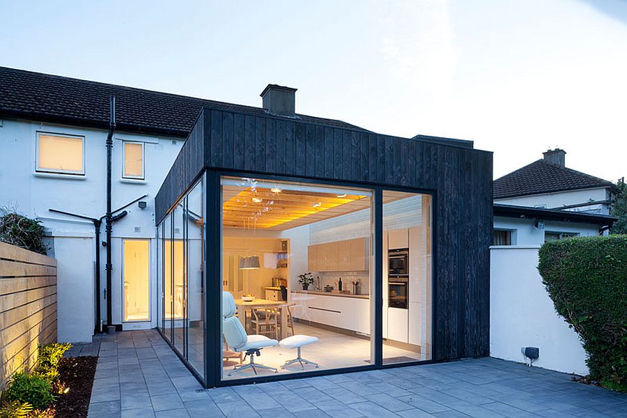 Charred timber cladding and glass extension to North Dublin home