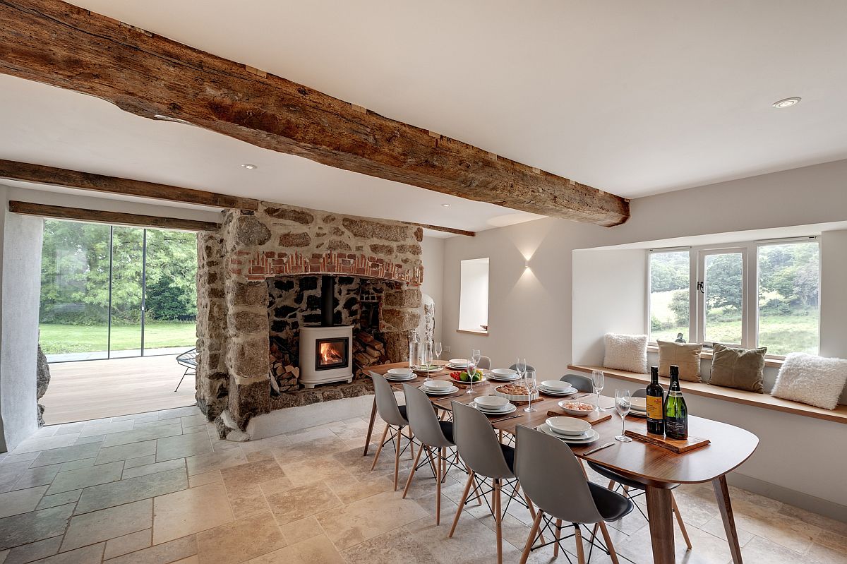 Classic wood-burning fireplace for the dining room