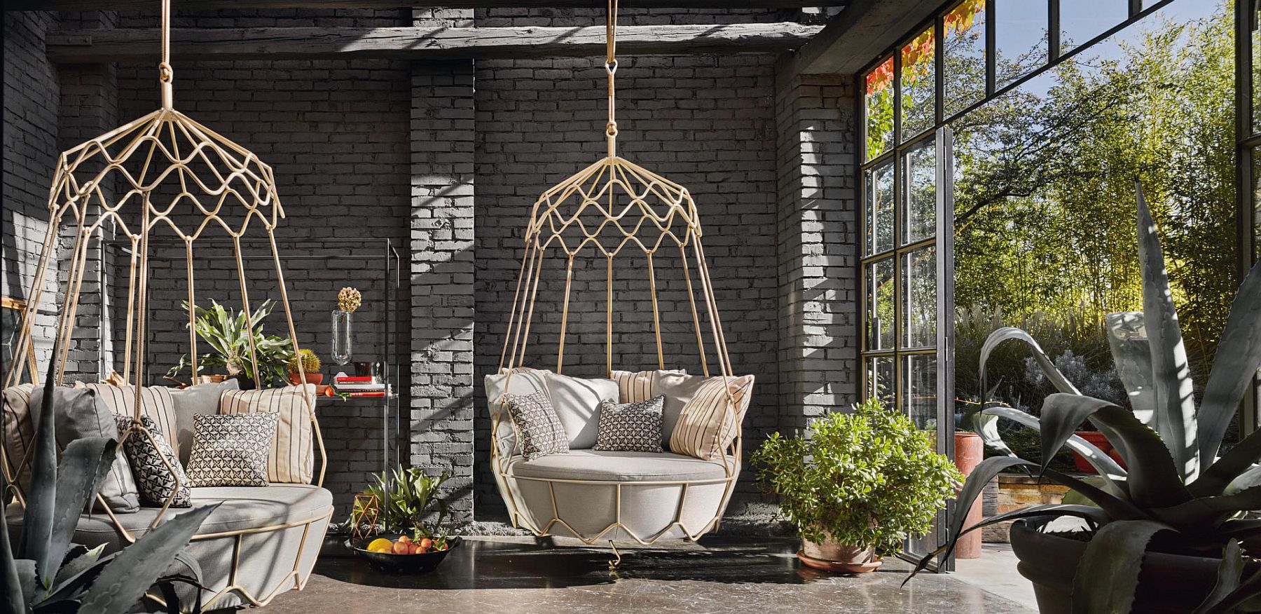 Comfy-swinging-outdoor-sofa-Gravity-is-perfect-for-the-sunroom