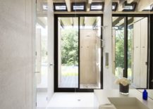 Contemporary-bathroom-in-white-with-large-windows-and-black-window-frames-217x155