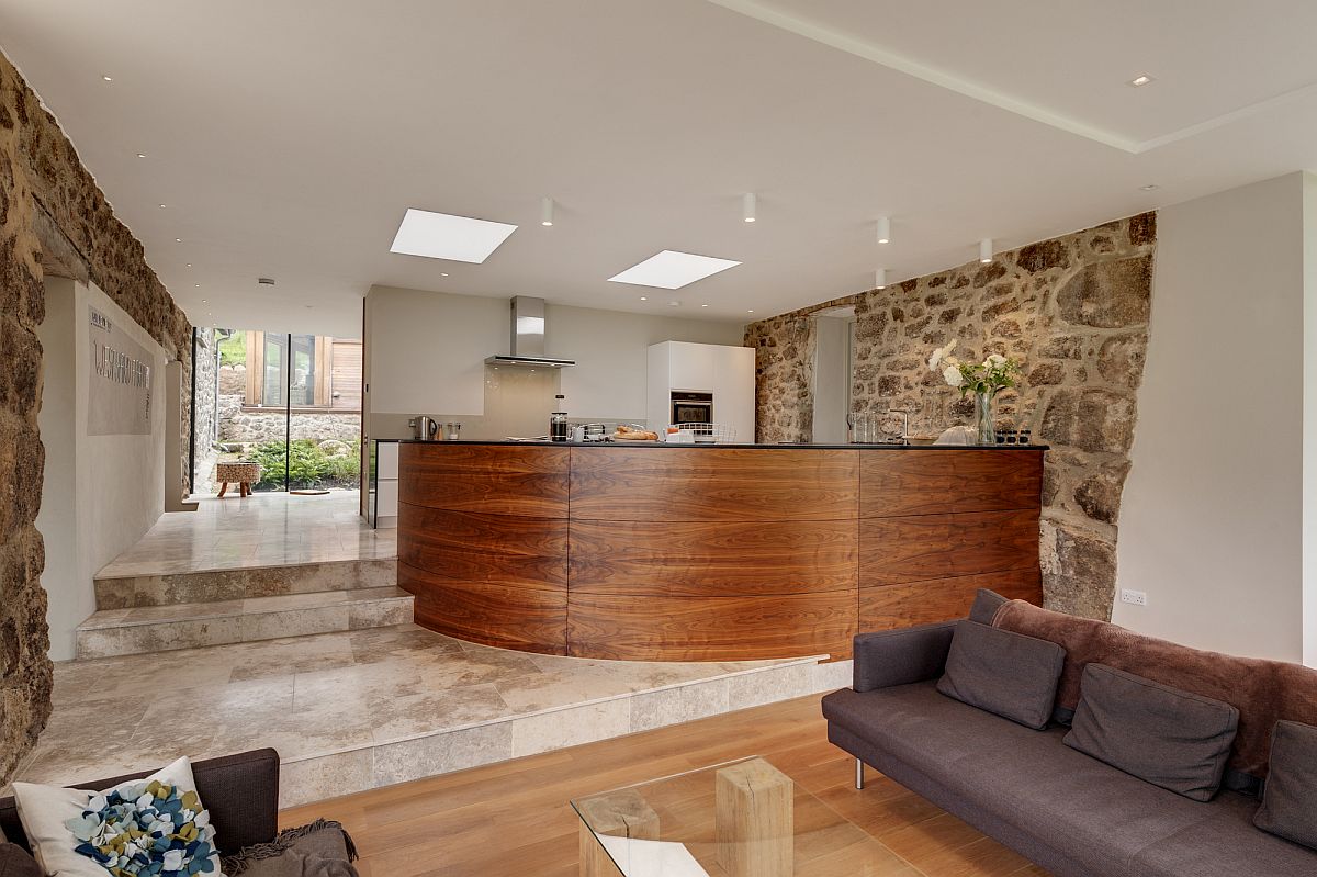 Curved island for the kitchen creates a lovely hangout