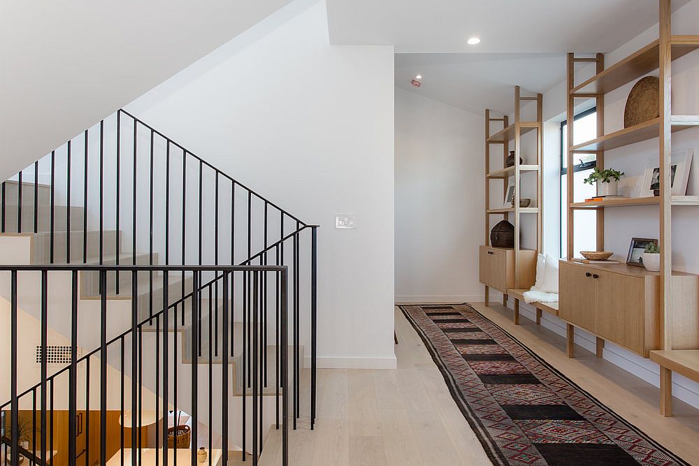 Custom cabinets turn the hallway into a lovely display area