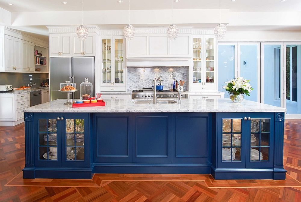 Expansive blue kitchen island with white marble top at its brilliant best!