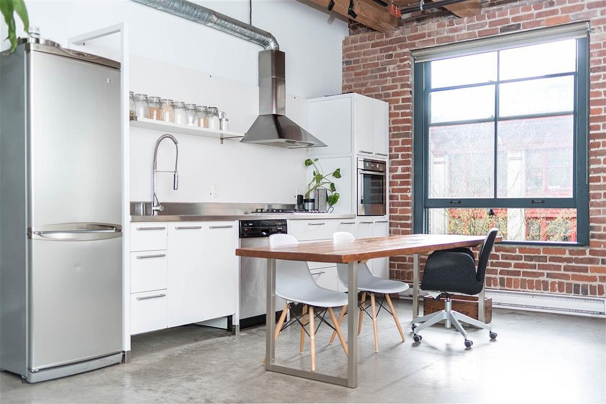 Exposed-brick-wall-and-polished-concrete-floor-for-the-Vancouver-apartment