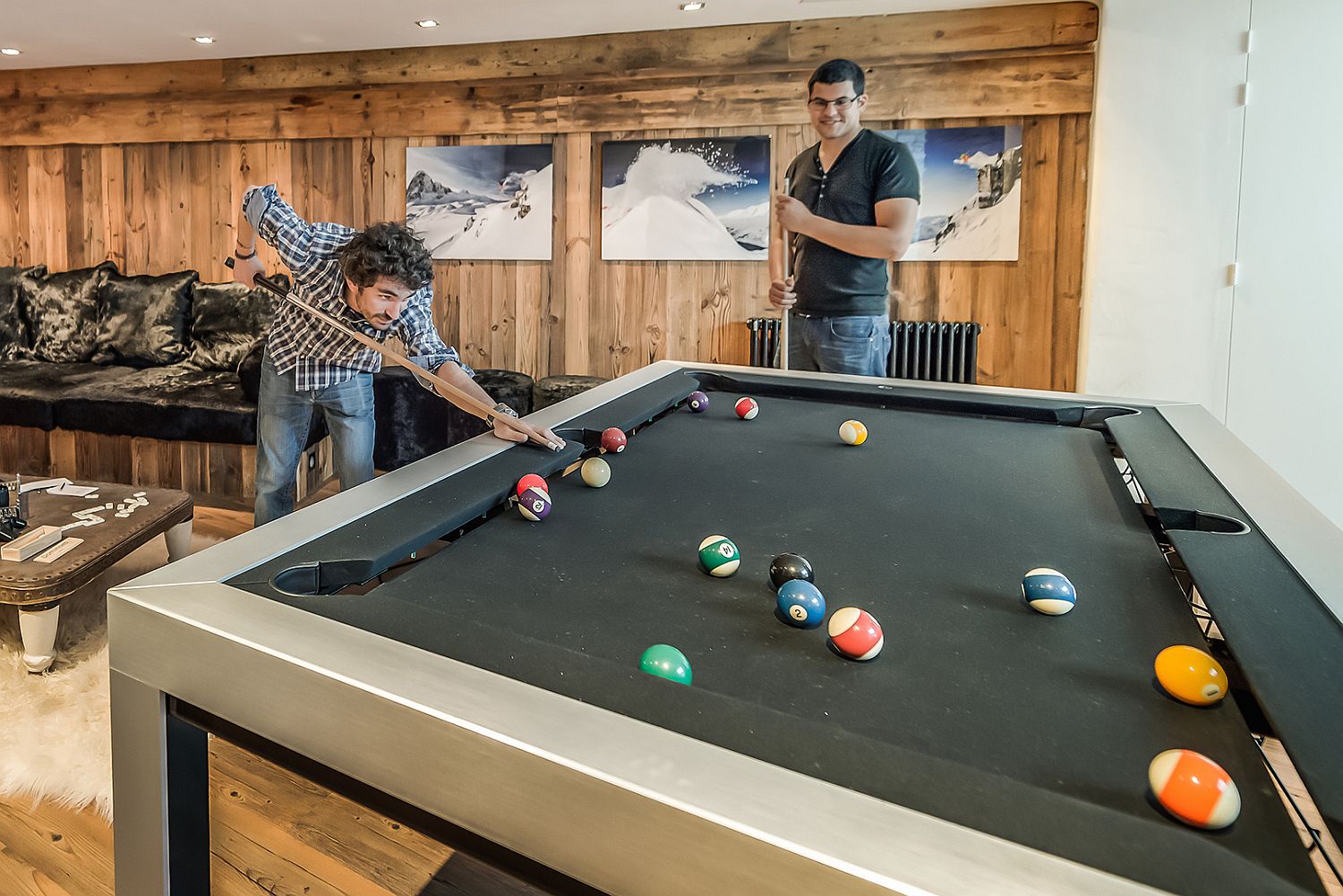 Game-room-with-pool-table-and-darts-board