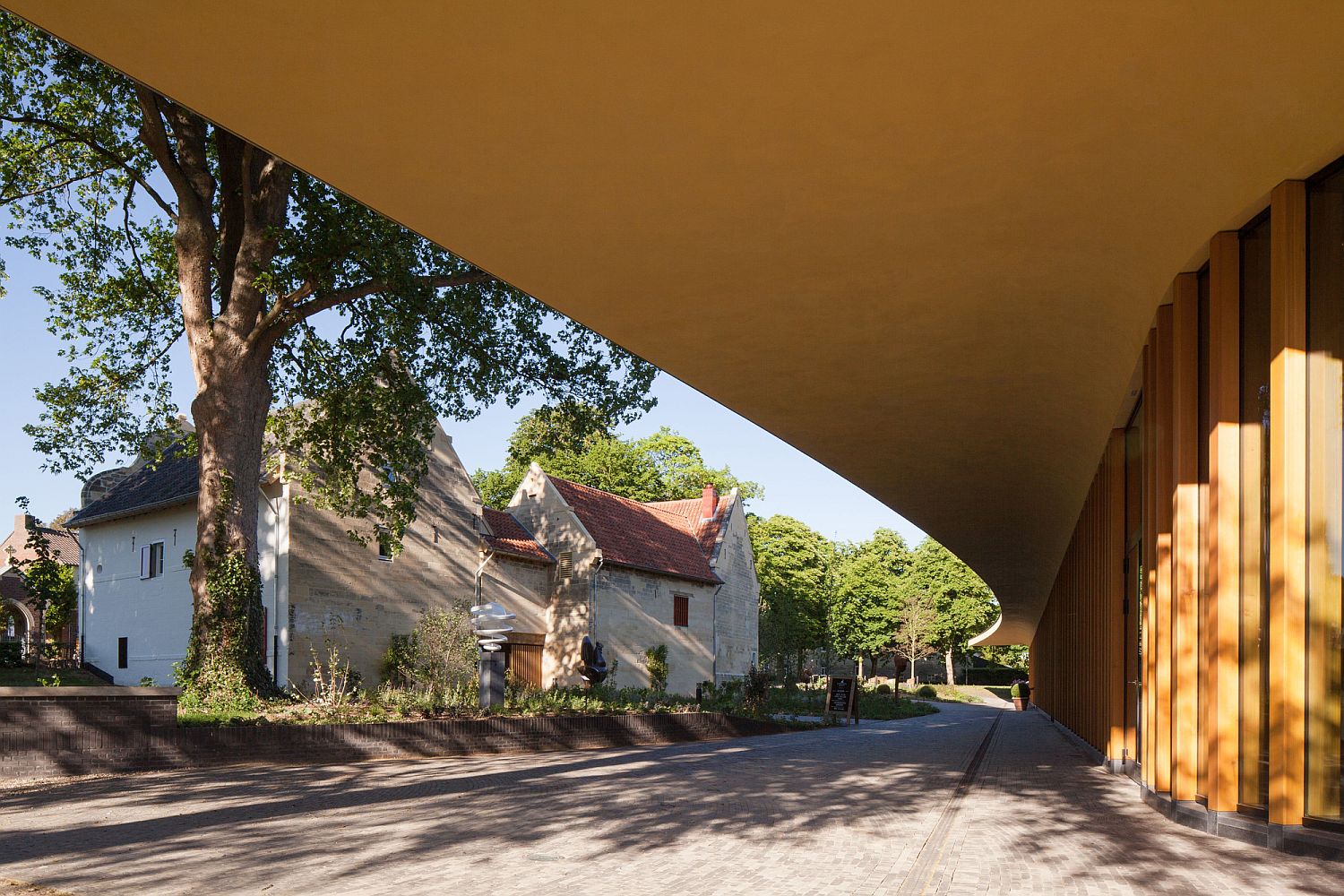 Generous overhang keeps out the sun and gives the pavilion a distinct look