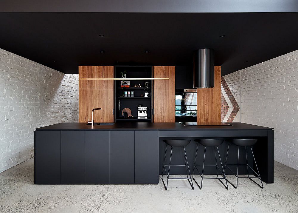 Interior of the cabinets in black add to the dramatic visual