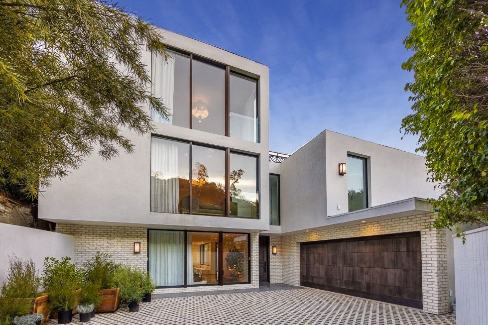 Kendall Jenner's modern driveway with potted plants