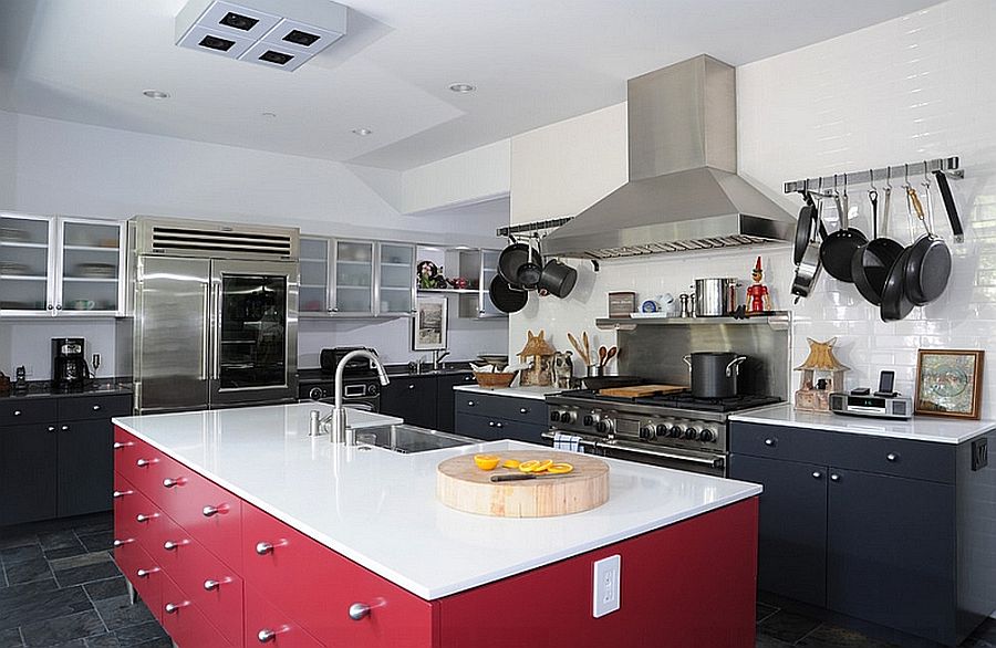 Kitchen in black and white with a polished red island