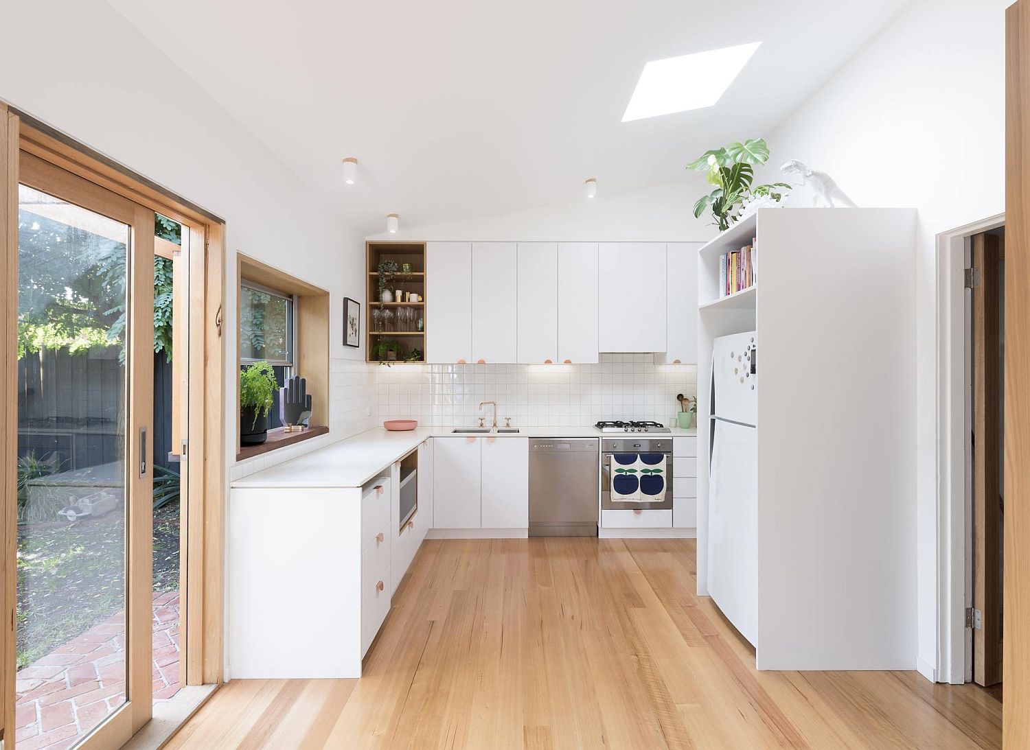 Kitchen in white with skylight