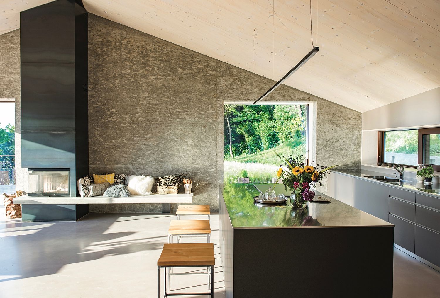 Kitchen with a comfy seat next to the fireplace