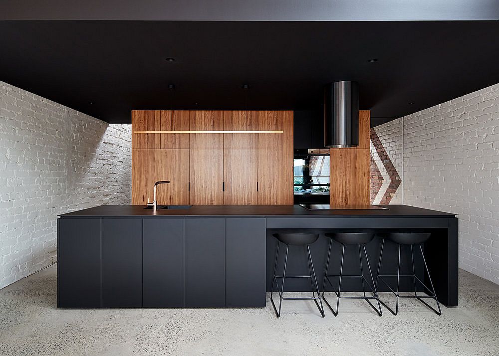 Kitchen with wooden cabinets in the backdrop