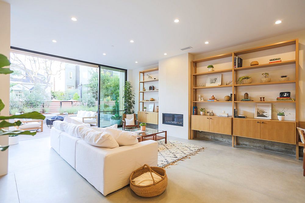 Large glass doors connect the living area with the front deck