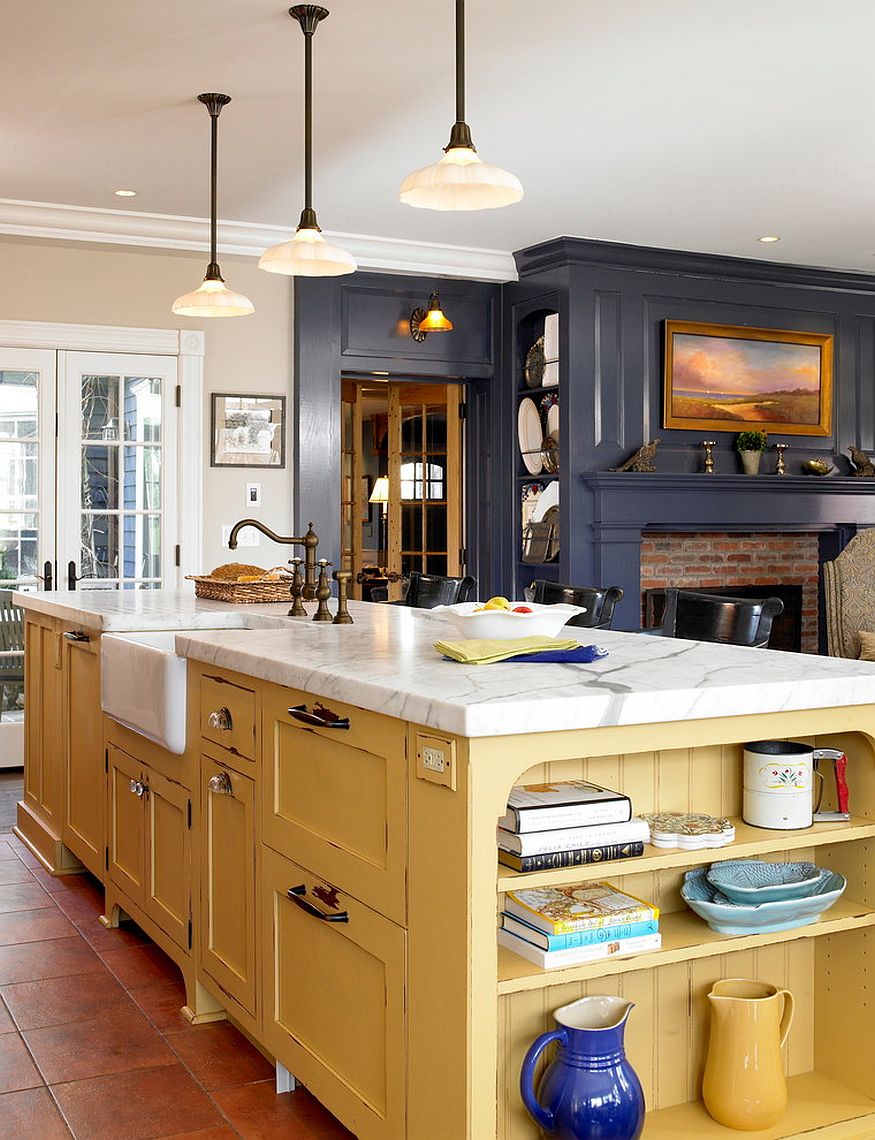 Mellow yellow kitchen island feels perfectly at home in a modern setting